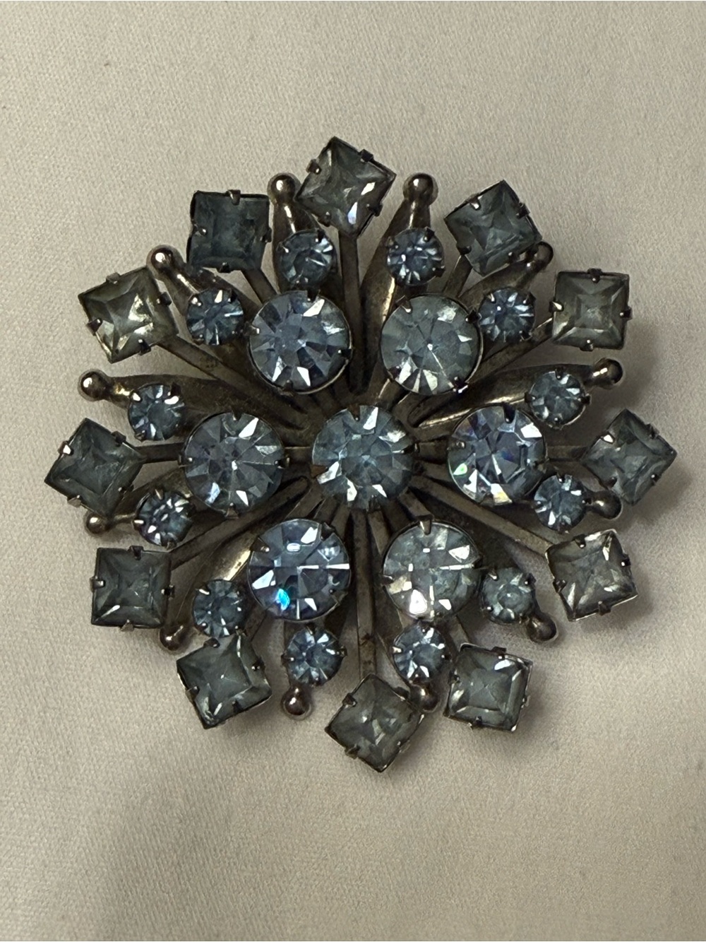 Vintage Rhinestone Starburst Brooch Silver Tone and Light Blue